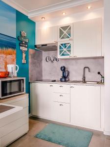 Een keuken of kitchenette bij Studio Blue Cocoon Westende