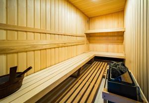 an empty sauna with a bench in the middle at BM Plaza in Bakuriani