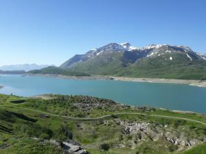 an aerial view of a mountain and a lake at Appartement dans chalet typiquement savoyard au pied des pistes in La Norma +2 photos