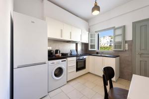 Virtuvė arba virtuvėlė apgyvendinimo įstaigoje Strata Home by Rocks Estates