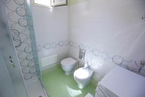 Kúpeľňa v ubytovaní Casa in centro + 13 fotografií