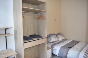 Postel nebo postele na pokoji v ubytování COLIVING TOUT CONFORT- LOOS LES LILLE-MAISON PARTAGEE-7 chambres-5 sdb-6WC-LOOS LES LILLE