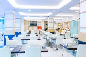Restauracja lub miejsce do jedzenia w obiekcie Aqua Hotel