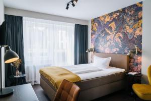 Postel nebo postele na pokoji v ubytování Hotel Stümpelstal
