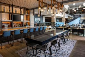 a dining room with a long table and chairs at Hyatt Regency Boston Harbor in Boston