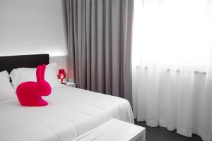 My Suite Hotel客房内的一张或多张床位