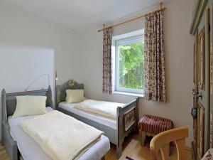 Posteľ alebo postele v izbe v ubytovaní Rosenhof am See Ferienwohnung Silberdistel