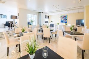 TV a/nebo společenská místnost v ubytování Trip Inn Hotel Astoria
