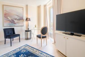 TV a/nebo společenská místnost v ubytování Trip Inn Hotel Astoria