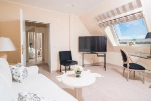 TV a/nebo společenská místnost v ubytování Trip Inn Hotel Astoria