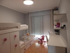Postel nebo postele na pokoji v ubytování La Perla Playa + 27 fotografií