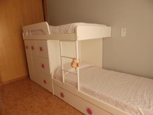 Postel nebo postele na pokoji v ubytování La Perla Playa
