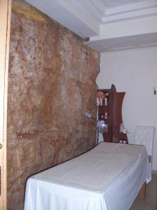 Postel nebo postele na pokoji v ubytování Hotel Madonna Delle Grazie