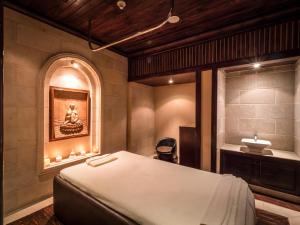 Кровать или кровати в номере The Cascades Golf Resort, Spa & Thalasso