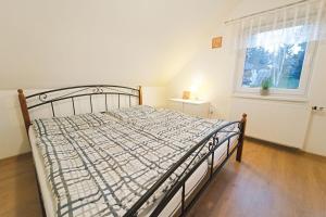 Posteľ alebo postele v izbe v ubytovaní Holiday Lipno