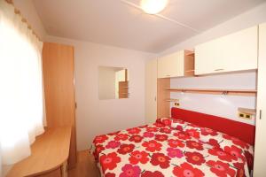 Camping Village Scaglieri客房内的一张或多张床位