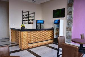 The lobby or reception area at La Stanar Hotel