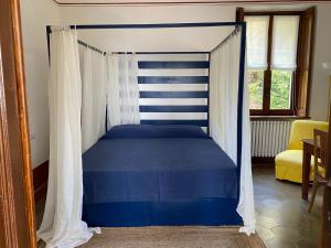 Кровать или кровати в номере Villino Tarlarini