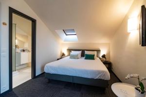 Letto o letti in una camera di Smart Bnb - Hotel Battice