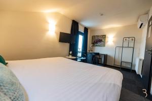 Letto o letti in una camera di Smart Bnb - Hotel Battice