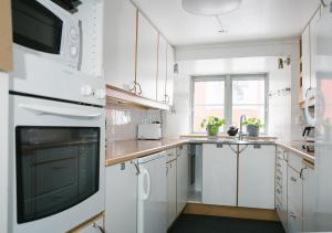 Kuchyň nebo kuchyňský kout v ubytování Visby Logi & Vandrarhem