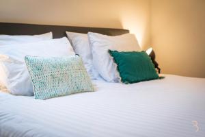 Letto o letti in una camera di Smart Bnb - Hotel Battice