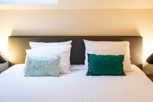 Letto o letti in una camera di Smart Bnb - Hotel Battice