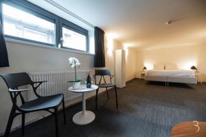 Letto o letti in una camera di Smart Bnb - Hotel Battice
