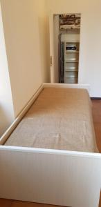 A bed or beds in a room at La G