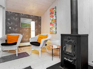 Et opholdsområde på 8 person holiday home in Fjerritslev