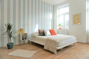 Łóżko lub łóżka w pokoju w obiekcie Modern 2Br Apartments - Full Kitchen - Schönbrunn Area - 15 Mins to City Center