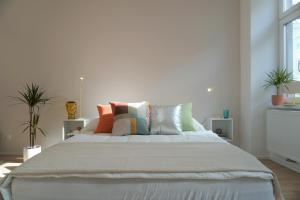 Łóżko lub łóżka w pokoju w obiekcie Modern 2Br Apartments - Full Kitchen - Schönbrunn Area - 15 Mins to City Center