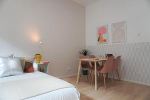 Łóżko lub łóżka w pokoju w obiekcie Modern 2Br Apartments - Full Kitchen - Schönbrunn Area - 15 Mins to City Center