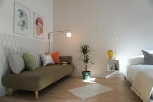 Łóżko lub łóżka w pokoju w obiekcie Modern 2Br Apartments - Full Kitchen - Schönbrunn Area - 15 Mins to City Center