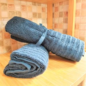 a blue knitted scarf on top of a table at Silver Ocean Puerto Lajas by Sea You There Fuerteventura in Puerto de las Lajas +38 photos