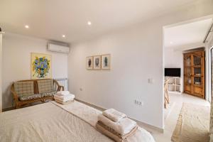 מיטה או מיטות בחדר ב-Apartment Mel de Flor