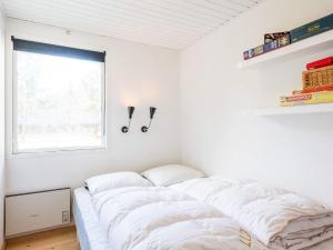 Cama ou camas em um quarto em Holiday home Nørre Nebel CXXII