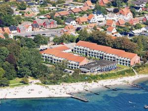 an aerial view of a resort on a beach at 4 person holiday home on a holiday park in Faaborg in Fåborg