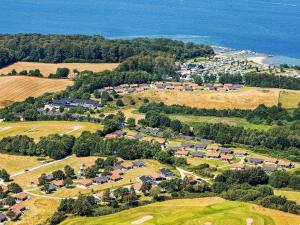 an aerial view of a town with houses and the ocean at 5 person holiday home on a holiday park in Aabenraa in Aabenraa