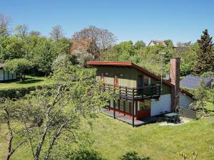 a small house in the middle of a field at 8 person holiday home in Allinge in Allinge