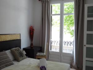 Posteľ alebo postele v izbe v ubytovaní Hostal Balkonis