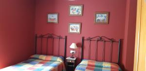 Un pat sau paturi într-o cameră la Casa Antonio y Benina