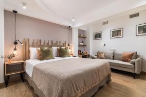 מיטה או מיטות בחדר ב-Linda Boutique Hotel