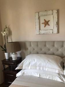 Katil atau katil-katil dalam bilik di il corbezzolo - Suite