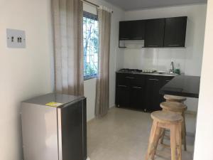 Kuchyň nebo kuchyňský kout v ubytování Cabaña Bellavista con Jacuzzi privado