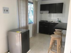 Kuchyň nebo kuchyňský kout v ubytování Cabaña Bellavista con Jacuzzi privado