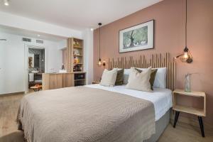 מיטה או מיטות בחדר ב-Linda Boutique Hotel
