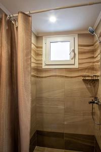 Ванна кімната в Valery Apartments