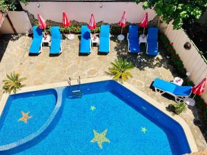 The swimming pool at or close to Plovdiv Hotel