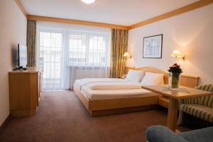 Katil atau katil-katil dalam bilik di Hotel Garni Angelika